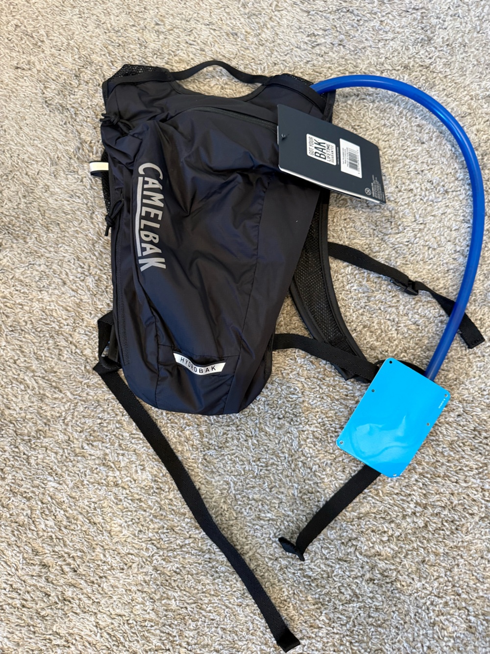 CamelBak Black Hydration Backpack with Blue Reservoir Tube